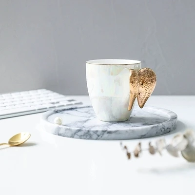 

2019 new style Scandinavian Luxury Creative Ceramic Cups Description Golden Angel Wing Cups Coffee Cup Black TeaCup Water Cup