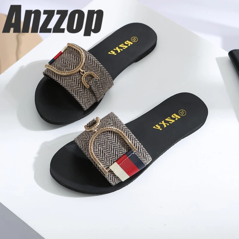 

Slippers women wear British style 2019 new luxury fashion young wild flat-bottomed metal buckle trend simple hot sale sandals