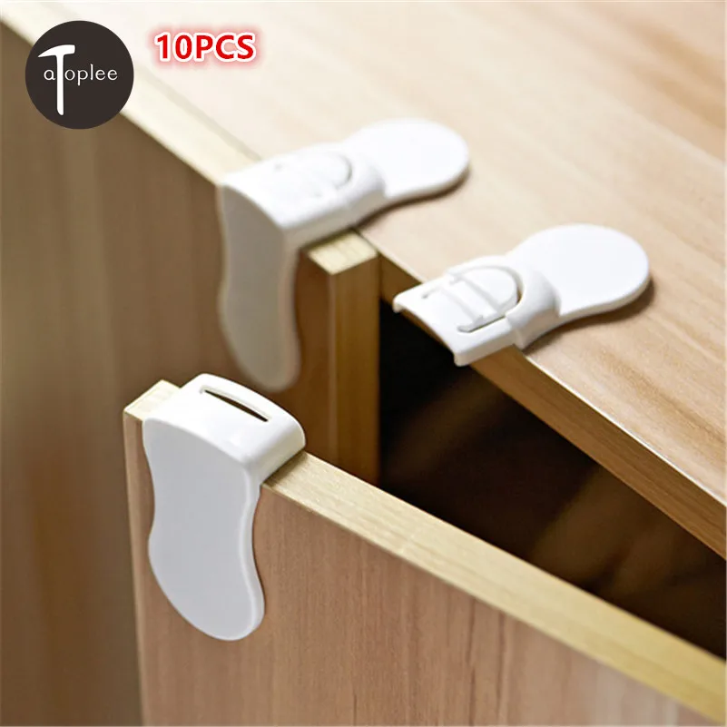 замки на шкафчики от детей. блокираторы для шкафов от детей. блокиратор для шкафов secure lock 19008 happy baby. блокиратор на ящики от детей. угловой фиксатор выдвижных ящиков 00091 baby safety.