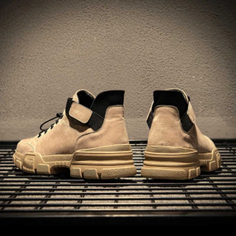 

Winter Korean version of the trend of England wild autumn tooling shoes leather high to help cotton shoes men's casual shoes.