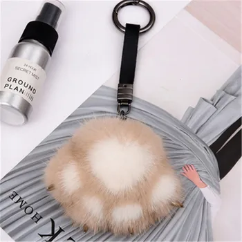 

Fashion Multi-Color 8cm Fluffy Mink Fur Keychain Wilf Claw Pompom Car Keychain Keychain Charm Frmale Bag Mobild Phone Pendant.