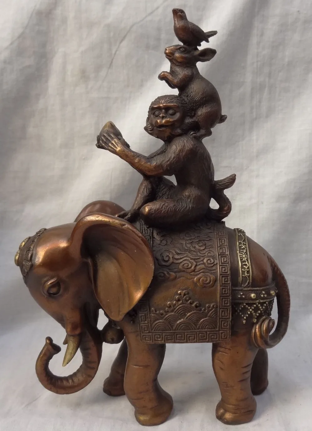

10" Chinese Pure Bronze Bird Rabbit Monkey Hold Peach Ride Elephant Brass Statue