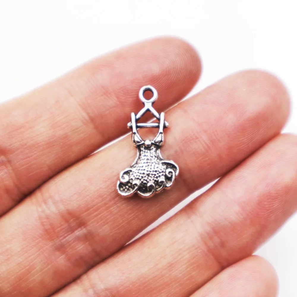 

Hot sell 30pcs metal antique silver charms Women's clothing skirt charms pendant for necklace jewelry findings
