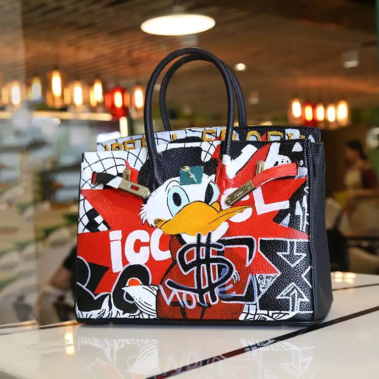 

New 2017 Women Bag Fashion Original design color cartoon hand-painted graffiti fashion hit platinum bag hand handbag large bag