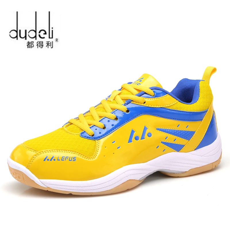 blue and yellow tennis shoes