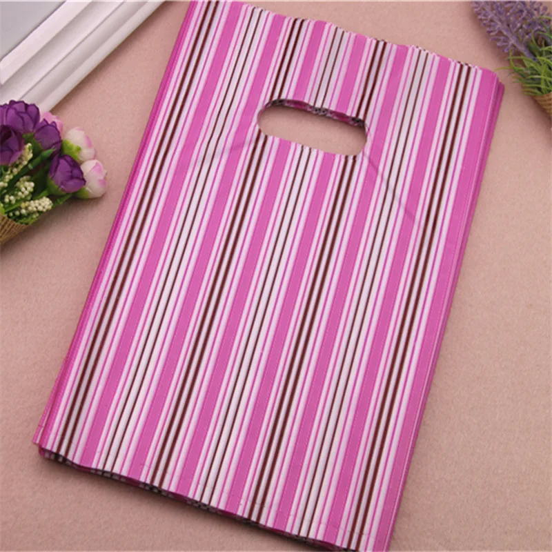 

2017 Wholesale 100pcs/lot 20*30cm Fashion Pink Line Plastic Gift Bags Shopping Package Bags Favor Birthday Gift Wrapping Bags