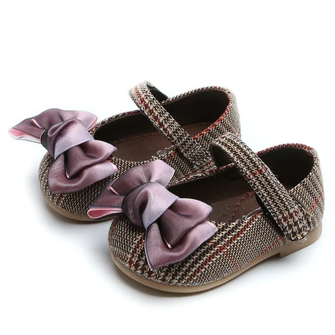 

Spring new bow girl princess shoes soft soles 0 / 1 year old baby learning shoes 100 pieces of girl baby leather shoes