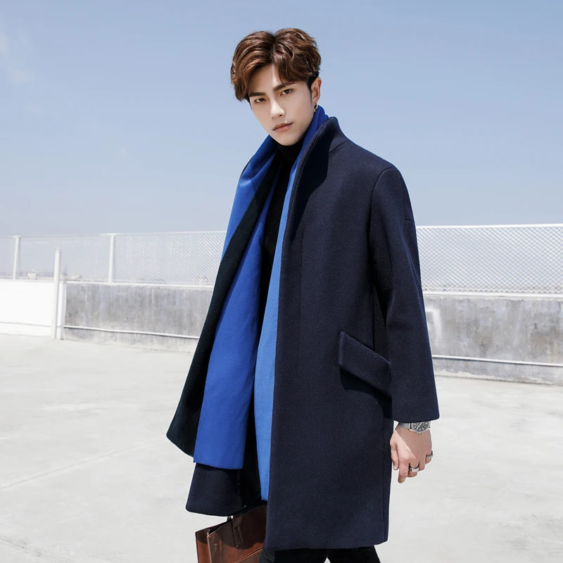Woollen cloth stand-up collar coat for young men Korean version loose windbreaker men's long winter woolen coat. Woollen cloth stand-up collar coat for young men Korean version loose windbreaker men's long winter woolen coat.