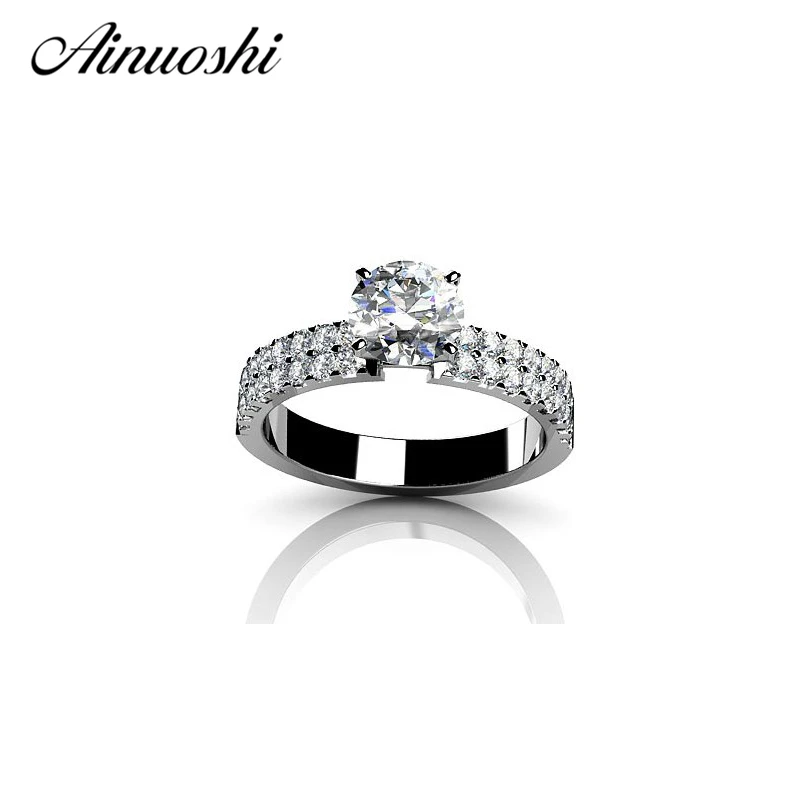 Ainuoshi Роскошные стерлингового серебра 925 1ct сверкающих круглой огранки 4 зубцами Для женщин свадебные Юбилей Обручальные кольца Для женщин