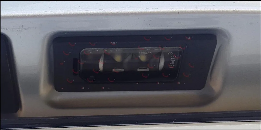 2015 touran license plate light