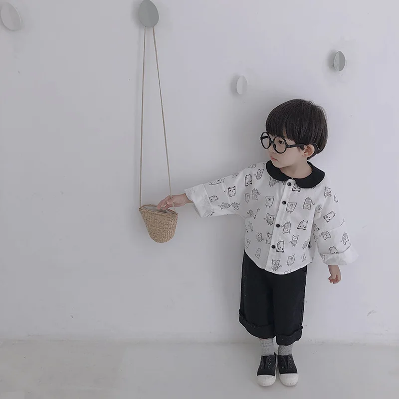 

Boys shirt long sleeve shirt early autumn Korean version of a generous doll collar a row of loose print shirts