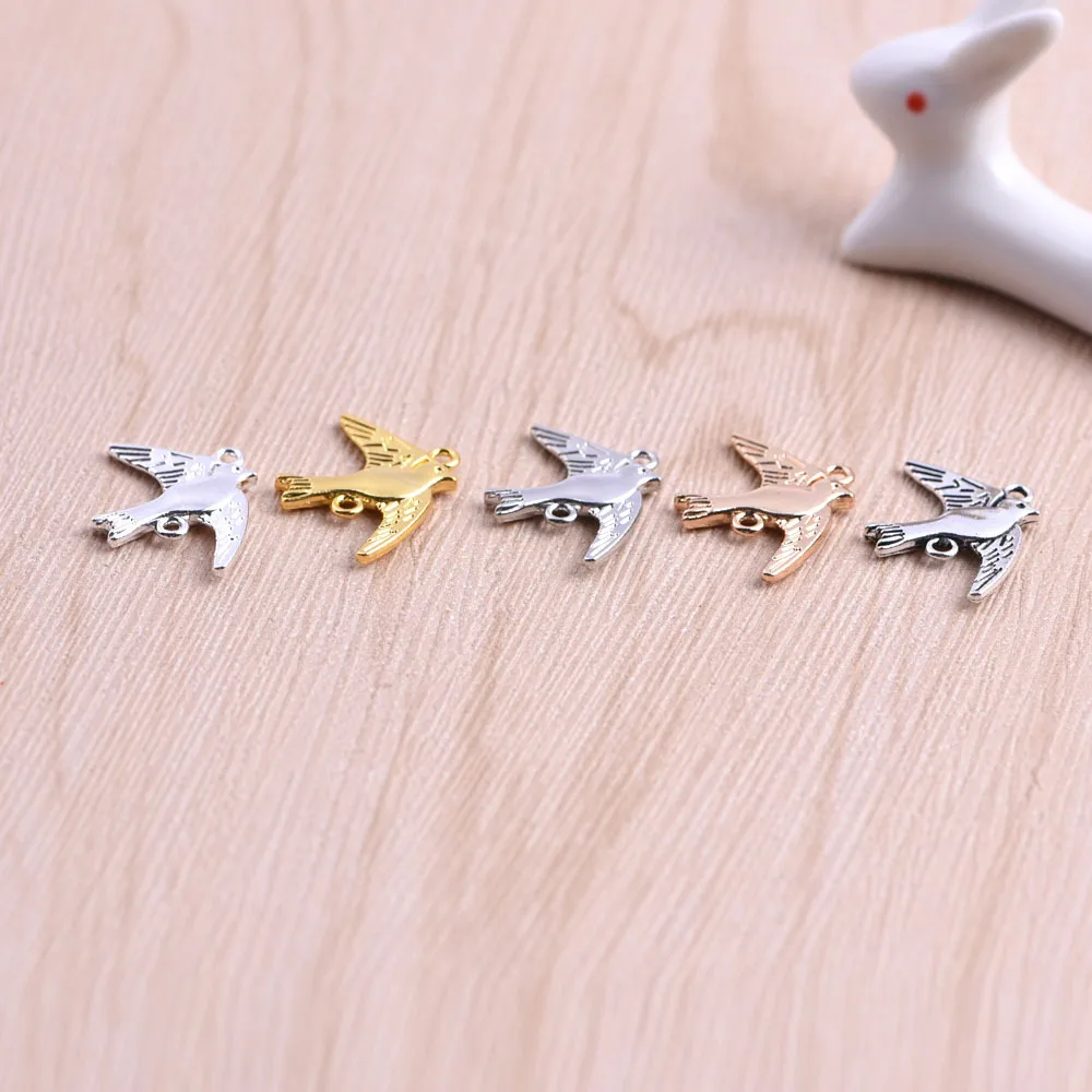 

Good Quality 50PCS/Lot 21.5mm*17.5mm Gold/ silver plated Flying Birds Charms for DIY bracelet&necklace wholesale