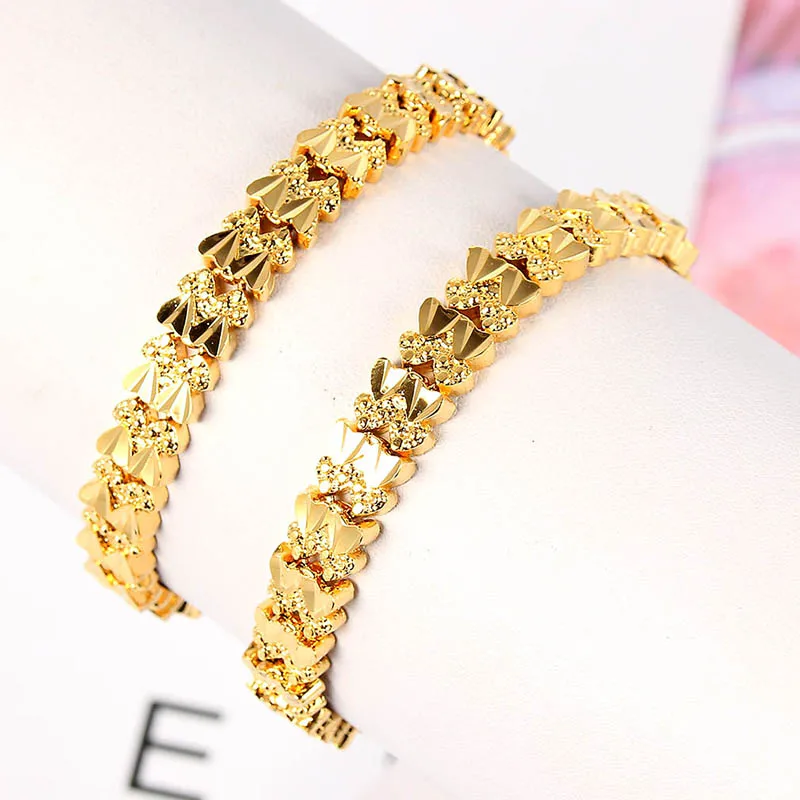 Woman's Gold Color Heart Charm Bracelets