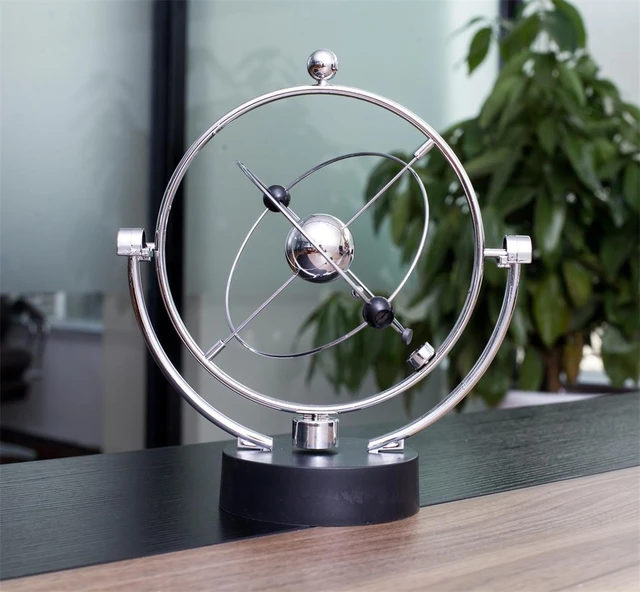 Office Desk Toy Gift Revolving Cosmos Perpetual Motion Machine