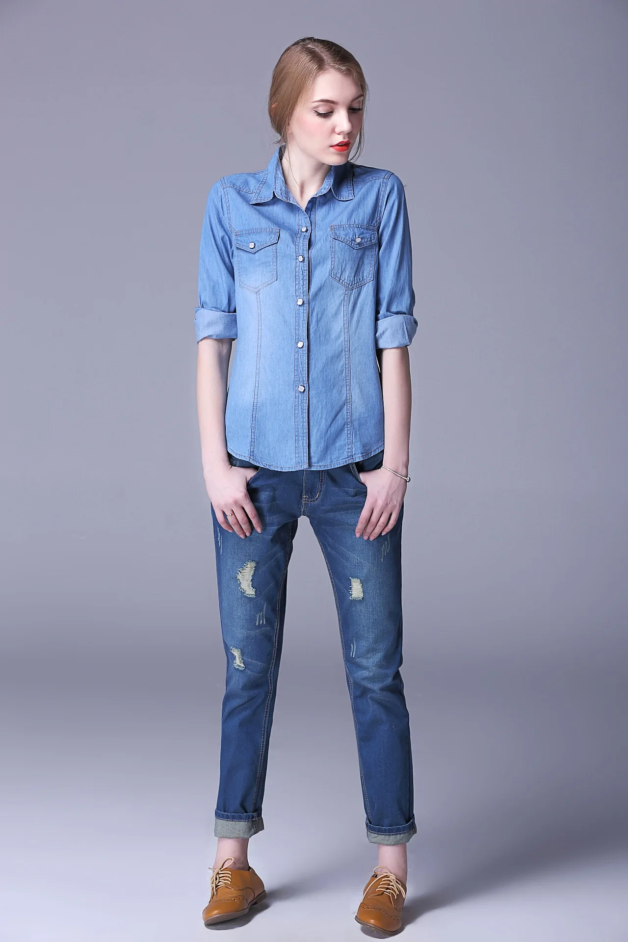 woman in jeans and shirt