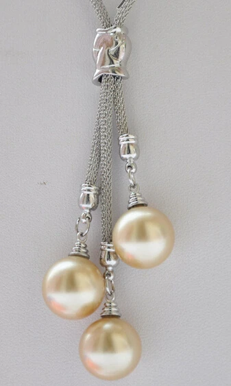 

Free Shipping ***Hot sale >>>>HOT 14mm golden round south sea shell pearl Stainless steel mesh necklace