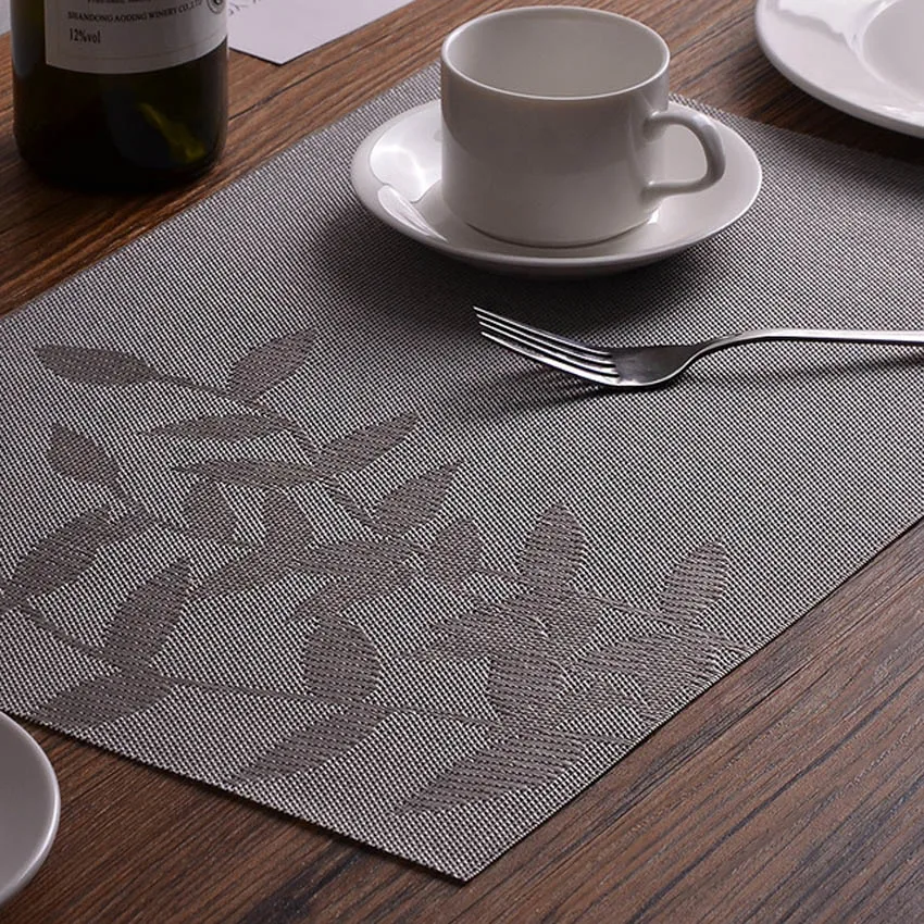 يترك الشمال كلوريد متعدد الفينيل العصري المفارش طاولة طعام حصيرة منصات القرص عاء الوقايات عدم الانزلاق مطعم الجدول الاكسسوارات 45x30 سنتيمتر