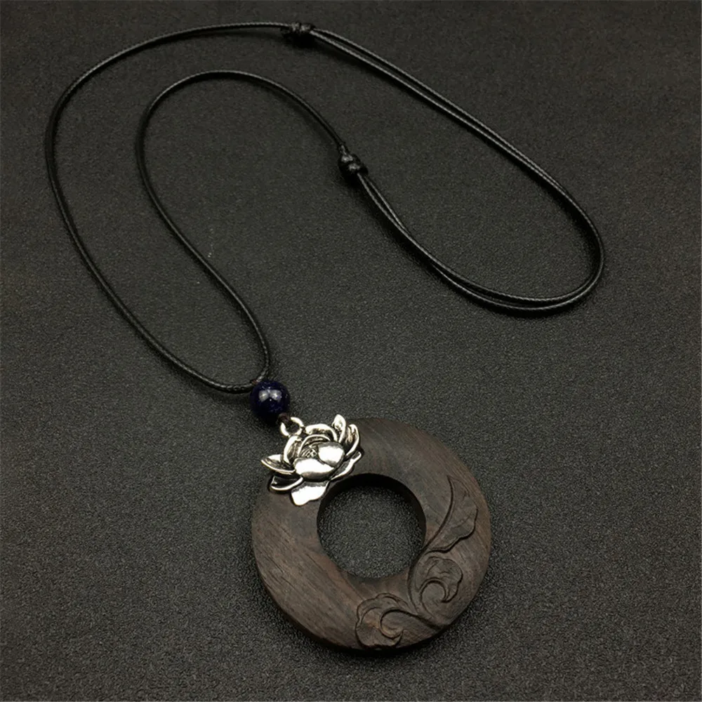

Fashion Carved Black Sandalwood Lotus Pendant Necklace Personality Women' Sweater Chain Ladies Leather Chain Necklace Dropship