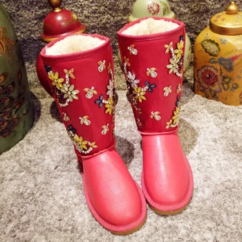 

Autumn and winter Europe station handmade sweet inlaid flowers warm snow boots fashion waterproof comfortable high boots.