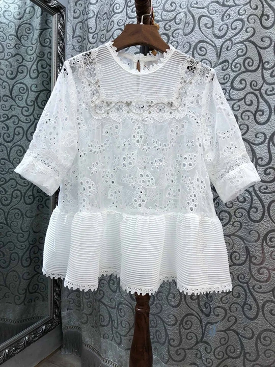

2019 summer new women's net color short-sleeved lotus leaf pendulum openwork embroidery shirt
