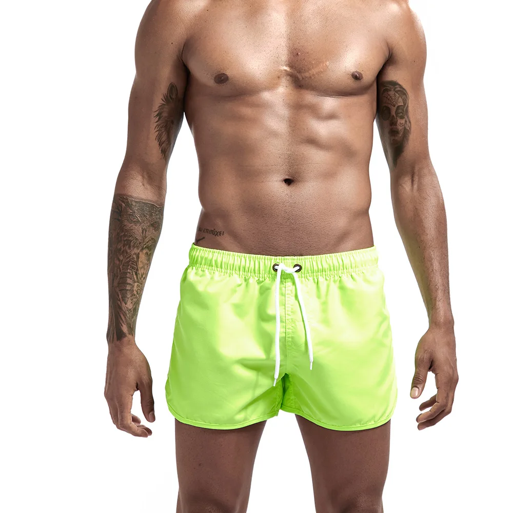 Мужские купальные плавки для геев, одноцветные мужские плавательные шорты для мужчин, купальный костюм для серфинга, пляжная одежда, мужские пляжные шорты Zwembroek Heren - Цвет: Light green