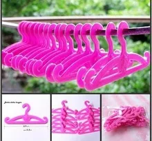 100Pcs lot Free Shipping Dolls Dress Hangers for 1 6 Dolls and Other Dolls 2 Designs