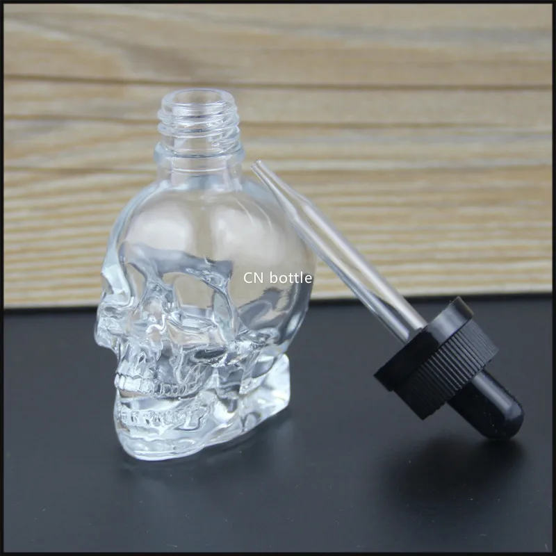 skull glass dropper bottle