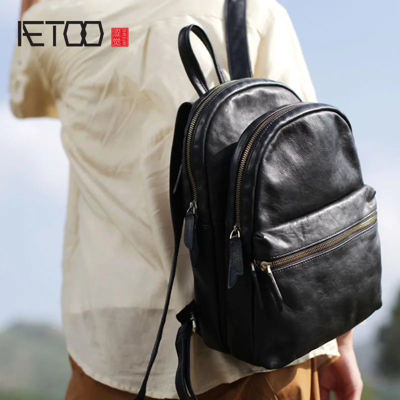 BJYL Retro casual black leather backpack new Korean soft leather men and women simple leather large capacity backpack