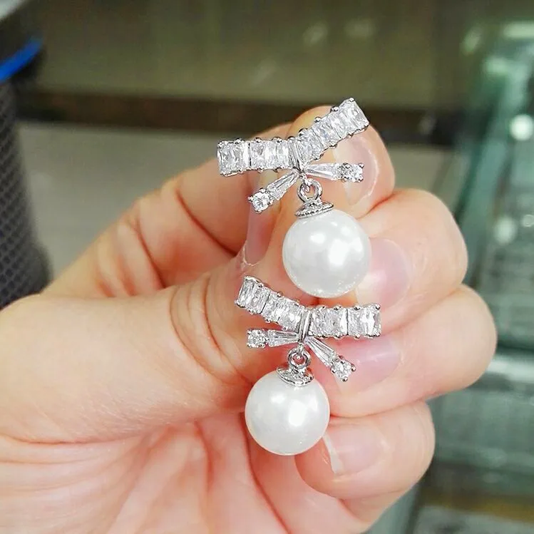 Модные женские милые серьги-гвоздики с бантиком; Цвет серебристый, золотистый; свадебные жемчужные серьги; Boho; Двойные серьги с цирконием для женщин