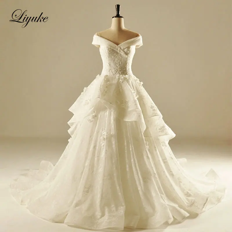 

Lustrous Tulle Sweetheart Neckline Beading A-Line Wedding Dress With Chapel Train Appliques Luxury Wedding Gown