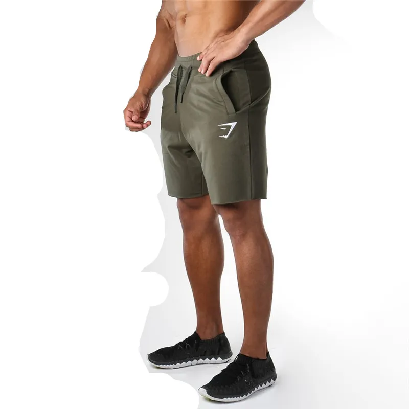 كمال الأجسام اللياقة السراويل الرجال ركض crossfit قصيرة المهنية تجريب ماركة الملابس عرق الصيف السراويل التجفيف السريع