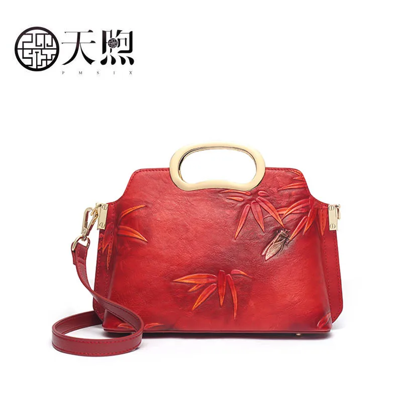 

First layer cowhide handbag 2019 new Chinese style embossed shoulder Messenger bag branded handbag