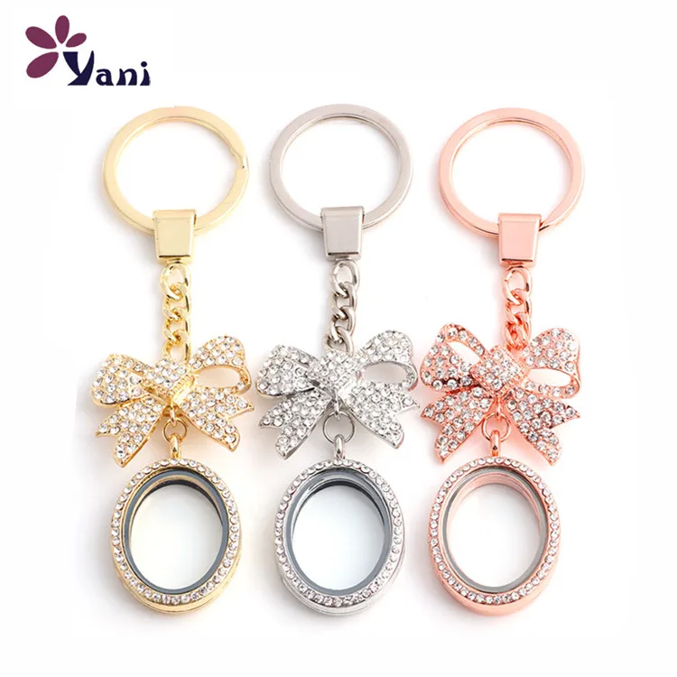 

10Pcs Crystal Oval Glass Relicario Living Memory Floating Locket Keychains With Bowknot Brooch Women Bag Gift Jewelry