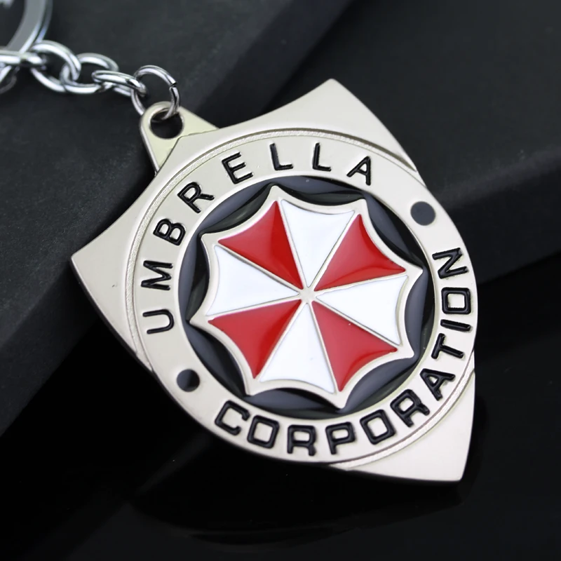 

Resident Evil 2 Colors Alloy Keychain Umbrella Corporation Logo shield shape Hoder For Fans Unique Movie Jewelry Accessories