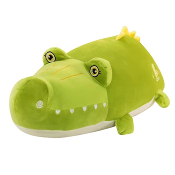 

Fat crocodile doll, plush toy, cute doll, long pillow on the bed