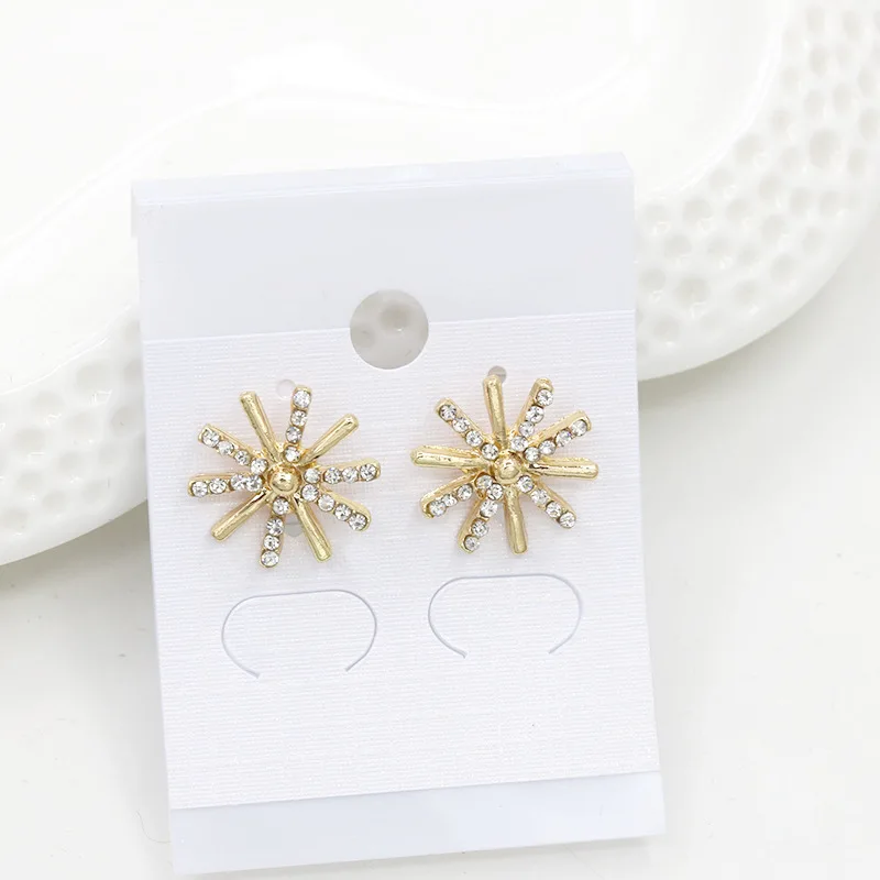 

Korean drama Hui Qiaomei with flash zircon snowflake earrings Korean earrings Exquisite windmill earrings