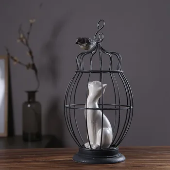 

White Cat Being Held In A Bird Cage Looking Out At The Bird Sculptures Statues For Decor Living Room Bedroom Home Accessories