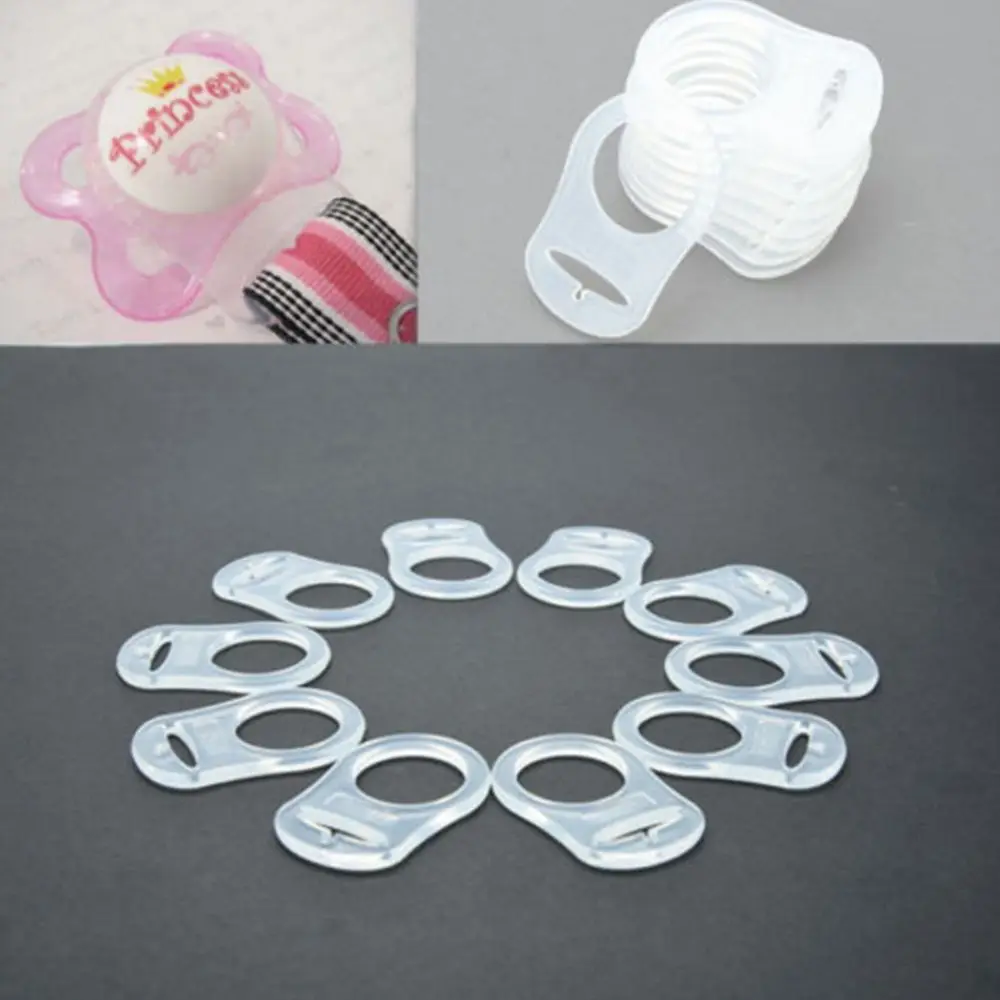 

Baby Boy Girl 10 pcs/Lot Clear Silicone Button MAM Ring Dummy / Pacifier Holder Rings Baby Pacifier Ribbon Clips Clip Adapter