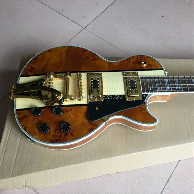 Best price at $305 Cheap High quality Natural color electric guitar to deliver EMS free shipping