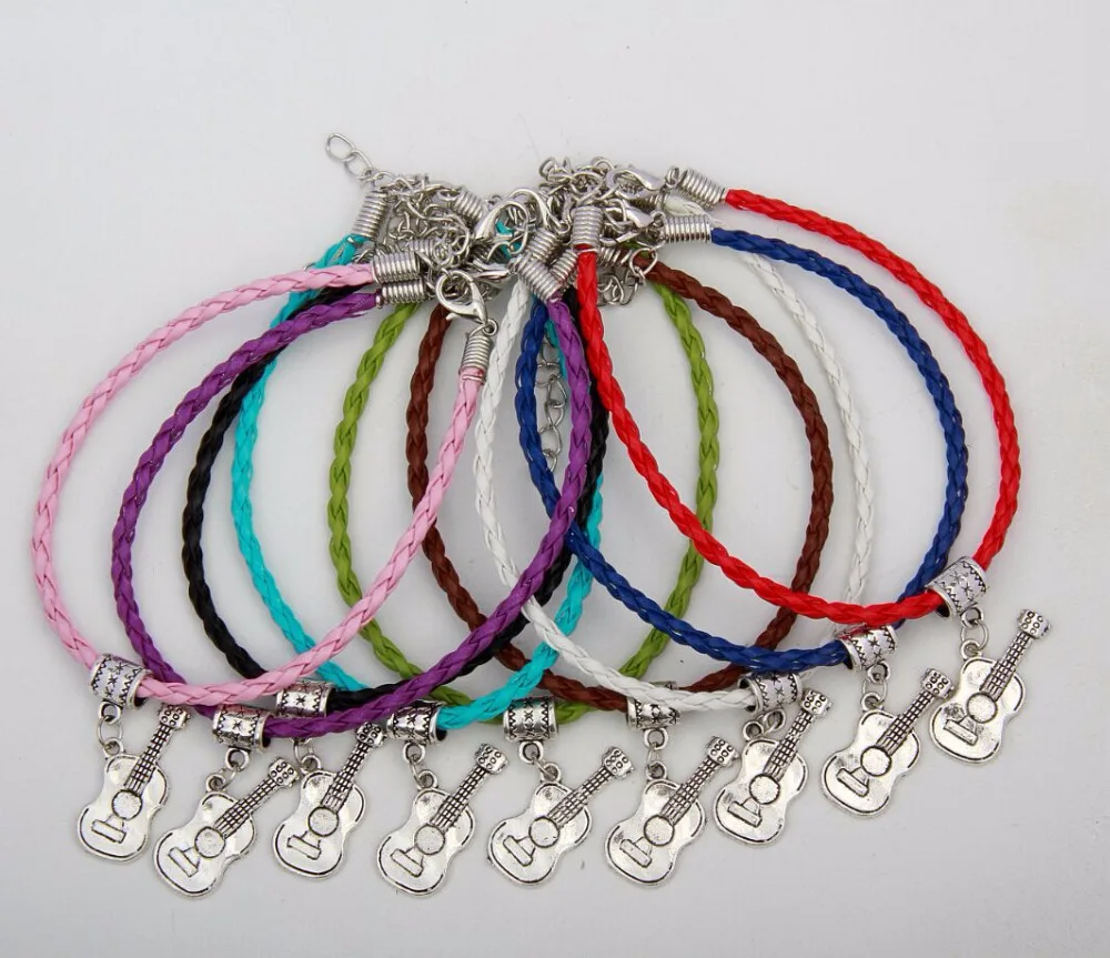 

Hot 50pcs Vintage Silver Lovely Dolphin Charms Pendants Mixed Color Braided Rope Bracelet Fashion Jewelry DIY For Women&Men S952