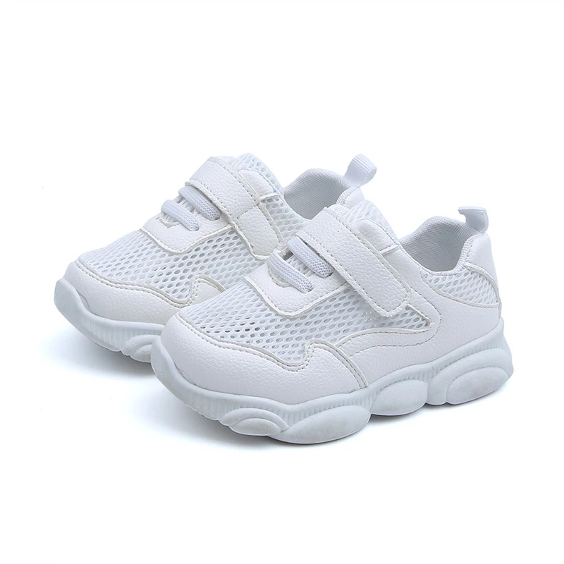 white sport shoes kids