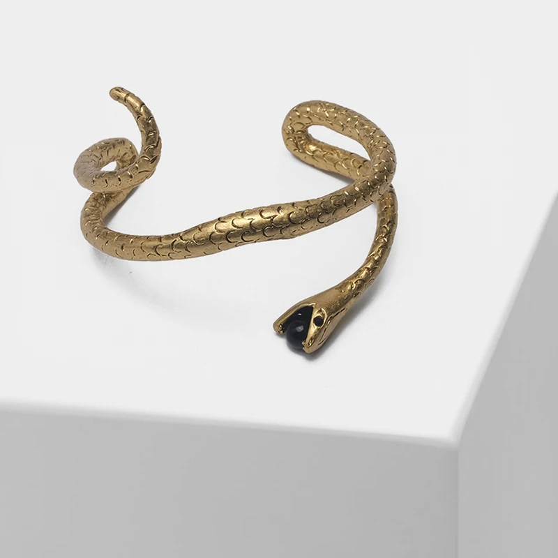 

Snake with black beads in its mouth designed retro bangles