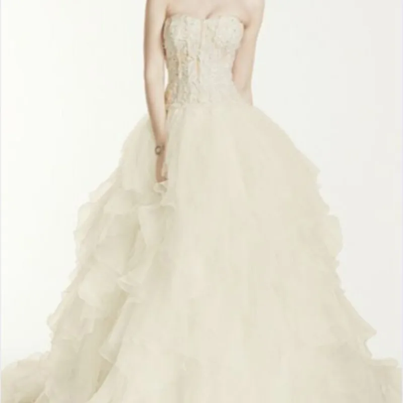 strapless ball gown with organza ruffle skirt