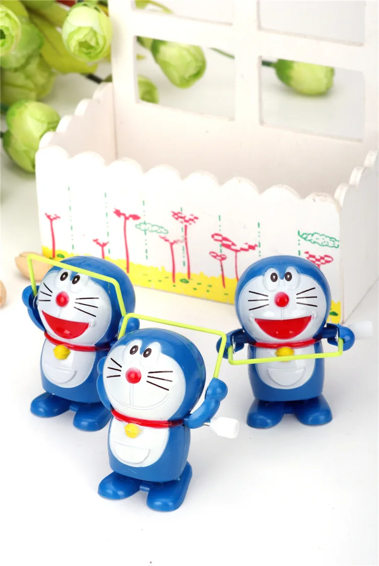 Супер смешной Jingle Cat Doraemon веревка прыгающая заводная игрушка для детей подарок на Рождество или день рождения заводная игрушка - Цвет: Random color