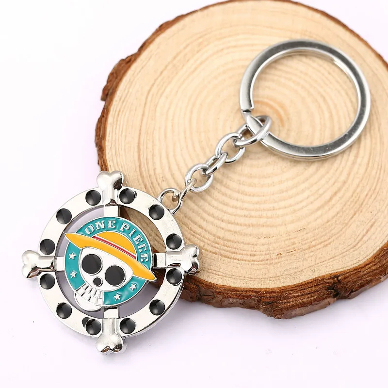 

Fashion Cool Metal One Piece Skull Keychain Rotatable Keyring Pendant Luffy Key Chains Holder Trinket for Fans HC11490