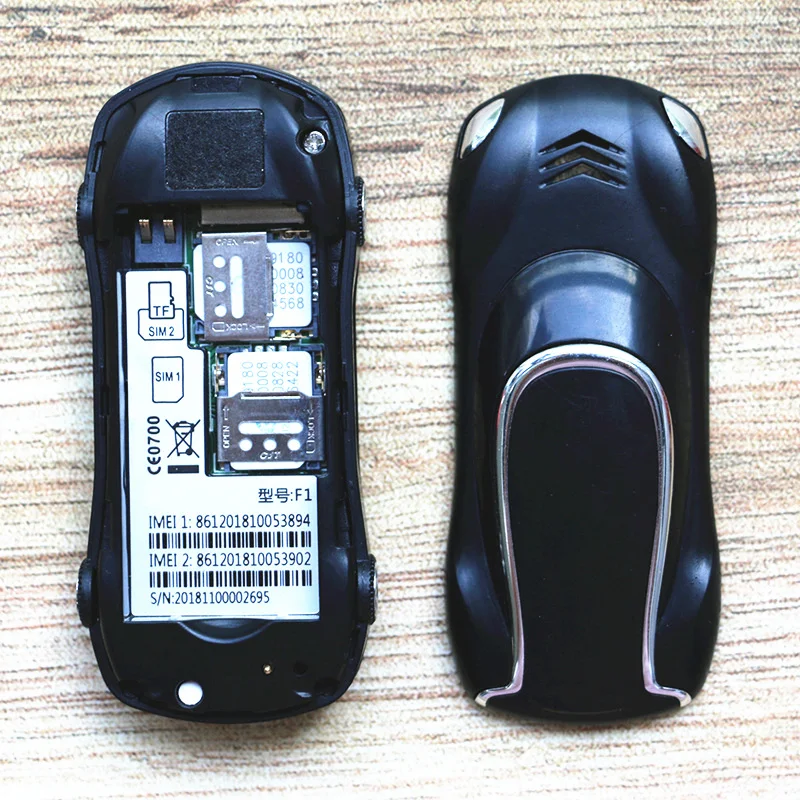Маленькая Автомобильная модель сотовый телефон карманный телефон для студенческого ребенка BT циферблат черный список Супер Мини Размер пластик низкий уровень радиации мобильный телефон