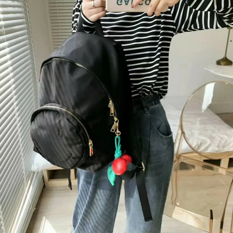 

2018 new thick nylon smiley shoulder bag student bag large capacity rest female backpack