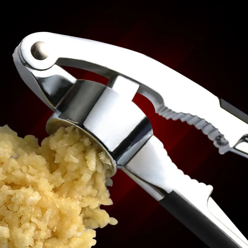

Multifunctional manual garlic press garlic mashed kitchen tool