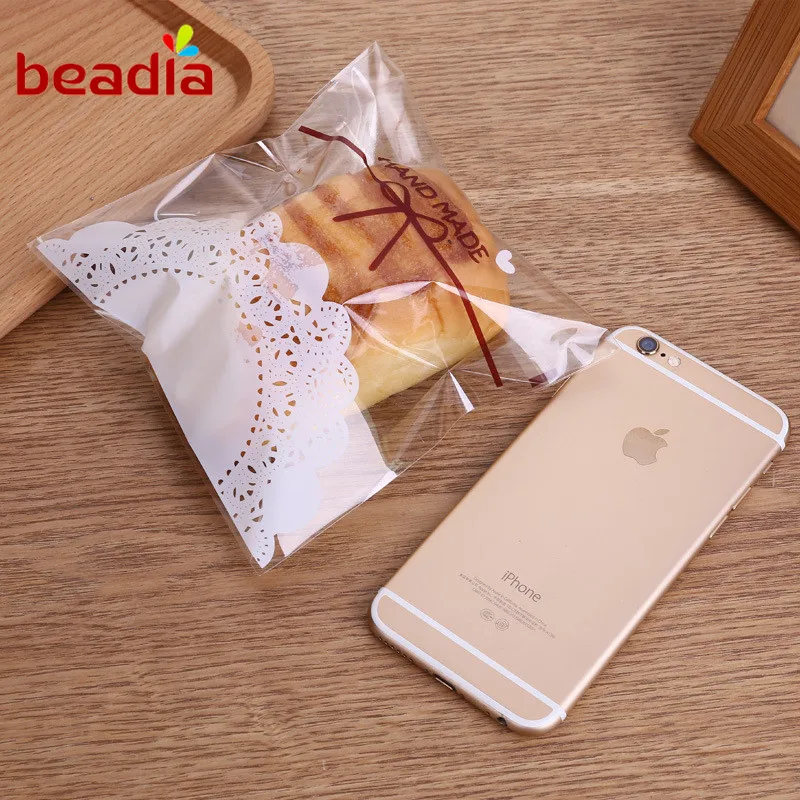 

100pcs/bag Bright Lace Bow Print OPP Self-adhesive Packaging for Biscuits Candy Gift Boxes & Bags Supplies