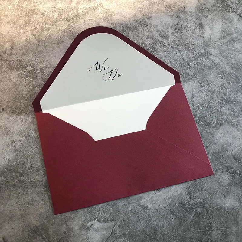 

burgundy invitation envelope with custom writing 135x195mm